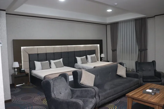 غرفة ديلوكس رباعية بسريرين كوين، Volga Hotel Baku 1/1