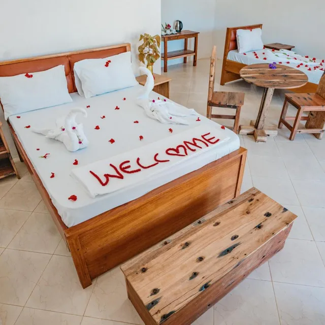غرفة ثلاثية بإطلالة على الحديقة، Bella Vista Resort Zanzibar 3/5