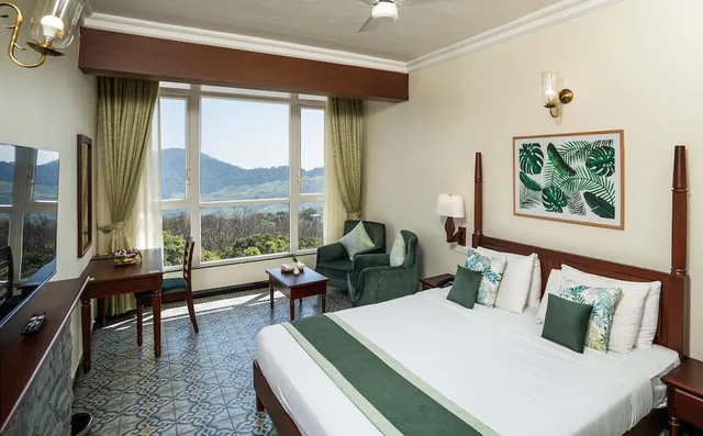 غرفة بريميوم بسرير كينج، FORT MUNNAR. 1/5