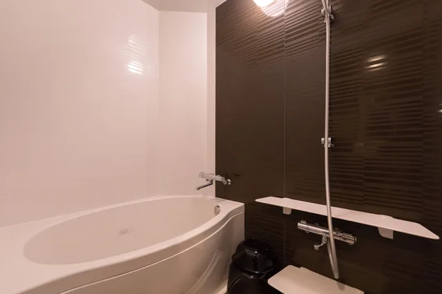 غرفة بأربعة أسرّة وثلاثة أسرّة مع أريكة، Hotel Miyajima Villa 2/2