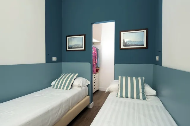 جناح عائلي بسرير كوين وسريرين منفصلين مع أريكة، Corso Italia Suites 4/10