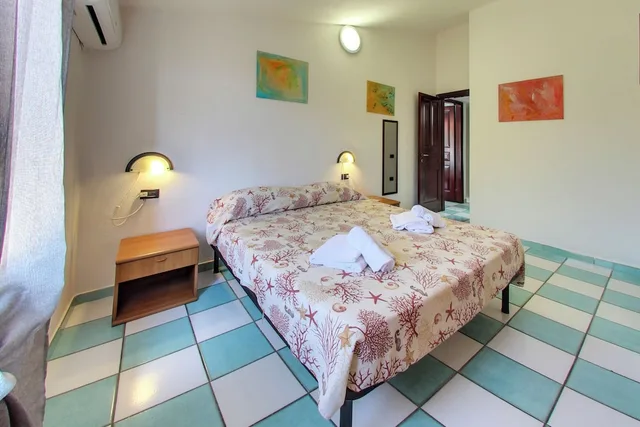 شقة بسريرين منفصلين بغرفتي نوم مع أريكة، Residence Oasi Anfiteatro 3/5