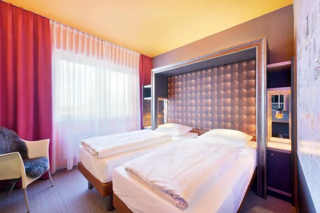 غرفة بسريرين منفصلين، Designhotel + Congress Centrum Wienecke XI 3/10