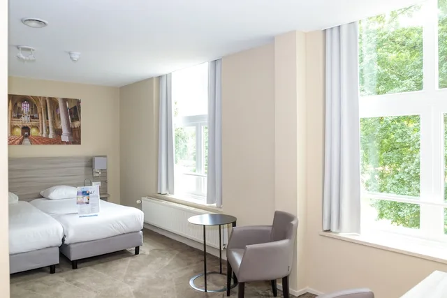 غرفة عائلية بسرير كوين مع أريكة، Fletcher Kloosterhotel Willibrordhaeghe 1/3