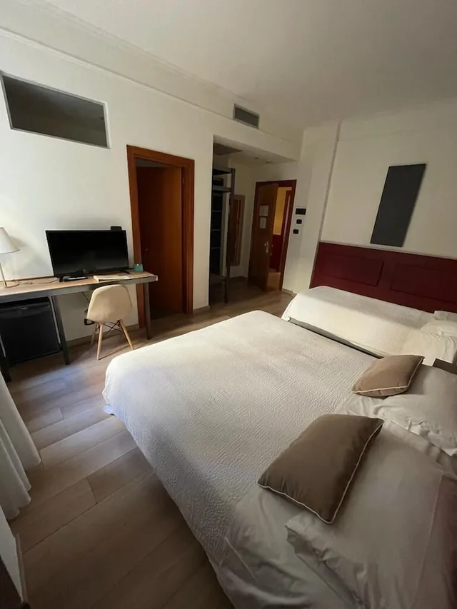 غرفة اقتصادية ثلاثية بسرير كوين مع أريكة، Hotel Italia 1/4