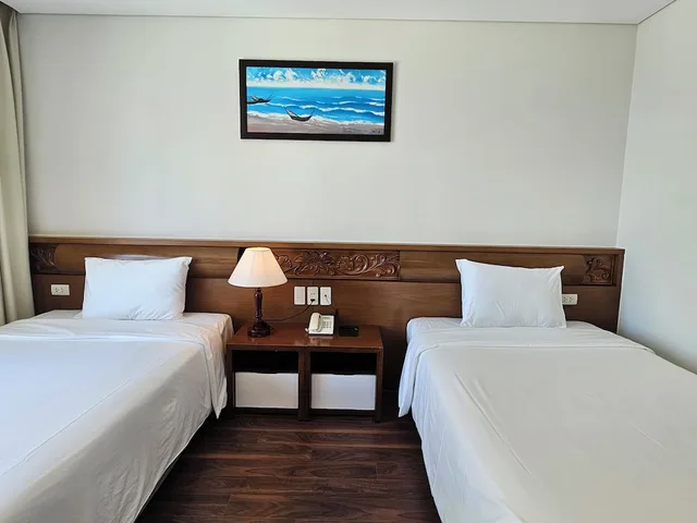 غرفة ديلوكس بسريرين منفصلين بإطلالة جزئية على البحر، Tamarind Hotel Da Nang 8/10