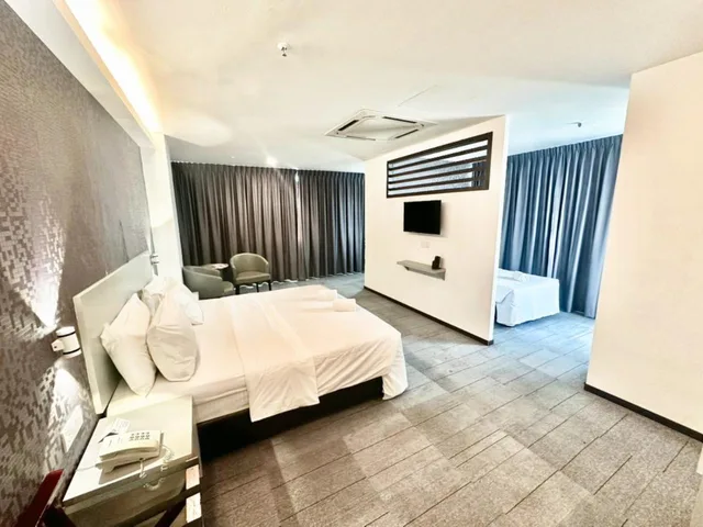 غرفة ديلوكس عائلية بسرير كينج وسرير فردي، MUAR TRADERS HOTEL 1/2