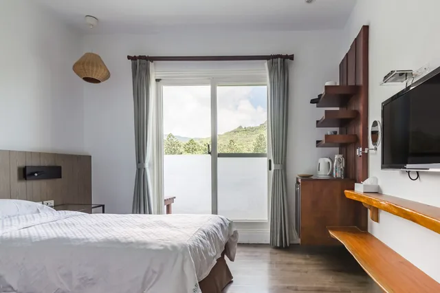 غرفة بسريرين منفصلين بشرفة، Kenting Fairyland & Farm Guest House 2/10
