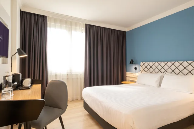 غرفة ديلوكس بسرير مزدوج أو سريرين منفصلين، Hotel Silken Rio Santander 1/3
