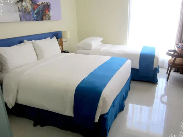 غرفة ثلاثية بسرير كوين وسرير فردي، Zia Hotel Kuta 2/4