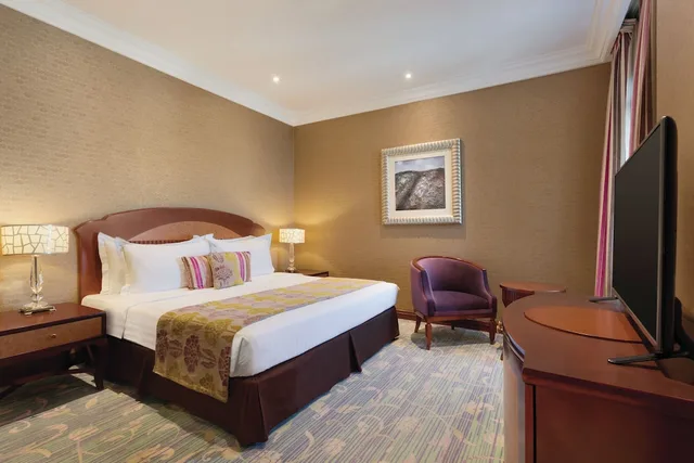 Junior Suite, King Bed, Grand Regency Doha Trademark Collection by Wyndham 1/2