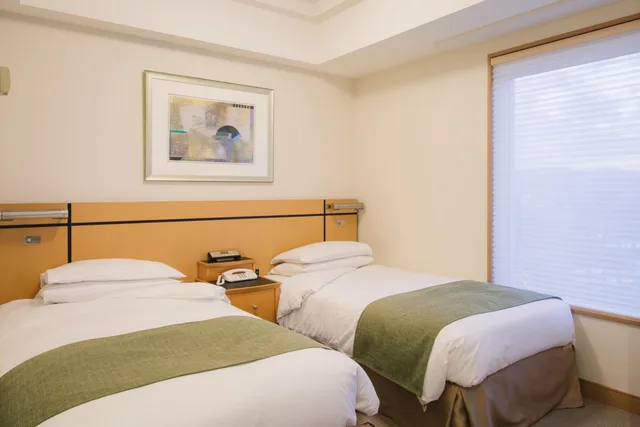 غرفة اقتصادية بسريرين منفصلين للمدخنين، Jr Hotel Clement Takamatsu 2/4