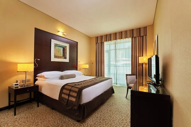 جناح تنفيذي بسرير كينج بإطلالة على المسبح بغرفة نوم واحدة، TIME Oak Hotel and Suites 3/5