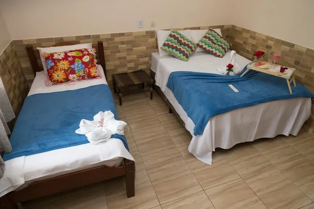 غرفة قياسية ثلاثية بسرير مزدوج وسرير فردي، Hotel Marajo 1/1