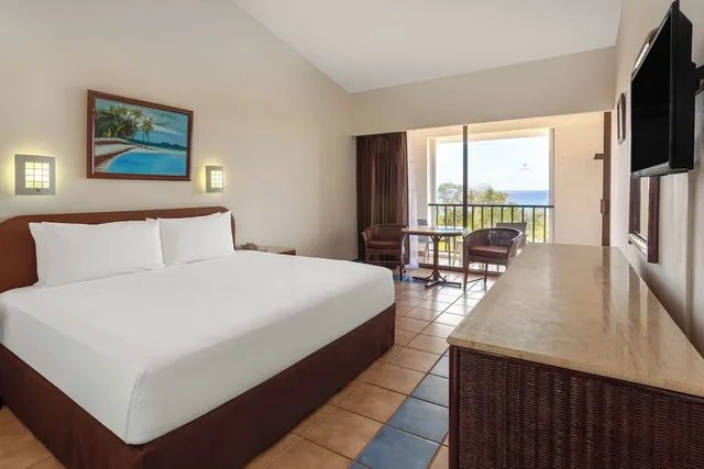 غرفة قياسية بسرير كينج بإطلالة على الحديقة بشرفة، Cozumel Hotel & Resort 1/2