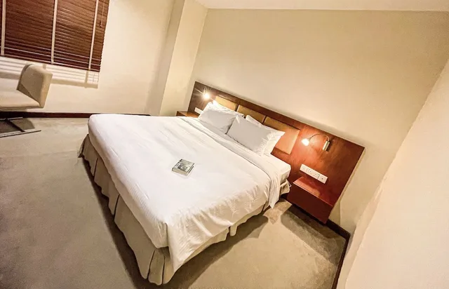 غرفة ديلوكس بسرير كينج وسرير كوين بغرفتي نوم، Wil'que Westlake Hotel & Residences 5/10