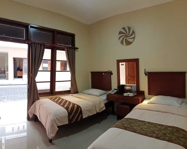 غرفة ديلوكس بسرير كوين، Maliboro Inn Hotel 2/2