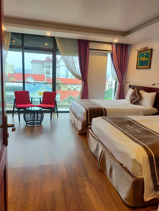 غرفة ديلوكس بسريرين مزدوجين بشرفة، Camellia Hotel 1/2