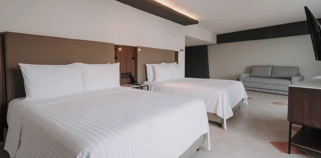 غرفة قياسية بسريرين مزدوجين بشرفة بإطلالة جزئية على البحر، HS Hotsson Smart Acapulco 5/10