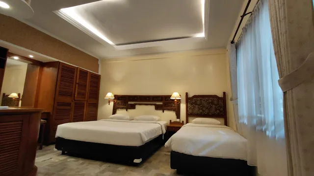 غرفة ثلاثية بإطلالة على الحديقة، Bali Bungalo Hotel 1/1