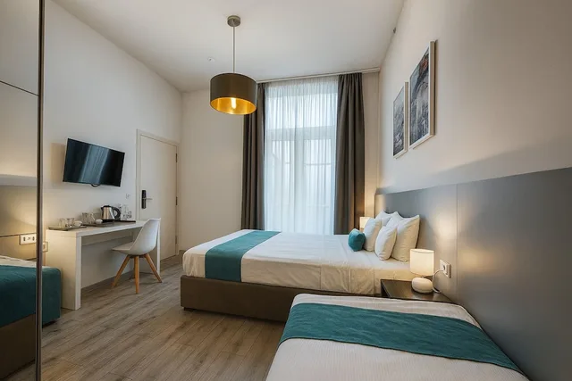 غرفة ديلوكس ثلاثية بثلاثة أسرّة، Hotel Mika Downtown 3/7