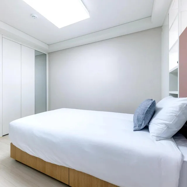 غرفة عائلية بسريرين منفصلين بإطلالة على البحر، Shin Shin Hotel Seogwipo 7/10