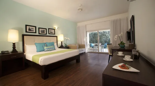 جناح جونيور بسرير كينج بإطلالة على الحديقة، Sandy Haven Resort 1/10