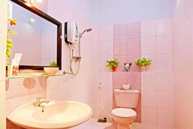 غرفة عائلية بسرير كوين وسرير فردي بإطلالة على الحديقة بشرفة، Green Garden Homestay 5/6