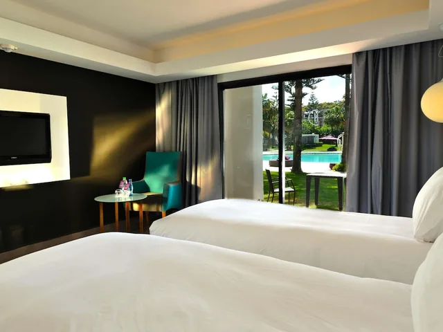 غرفة بريميوم سوبيريور بسريرين منفصلين بإطلالة على المسبح، Hotel Royal Golf and Spa Mazagan 1/5
