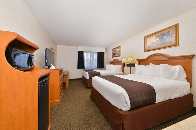 Standard, 2 Queen Beds, Pool Side، Revel Hotel Minot, SureStay Collection by Best Western 1/10