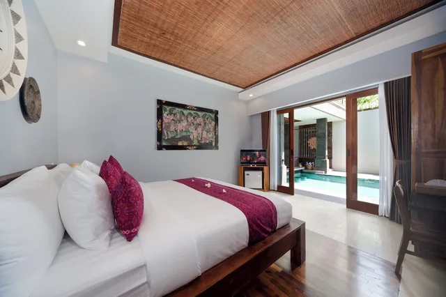 غرفة بسرير فردي بإطلالة على المسبح، Kusuma Living and Villa Seminyak 4/7