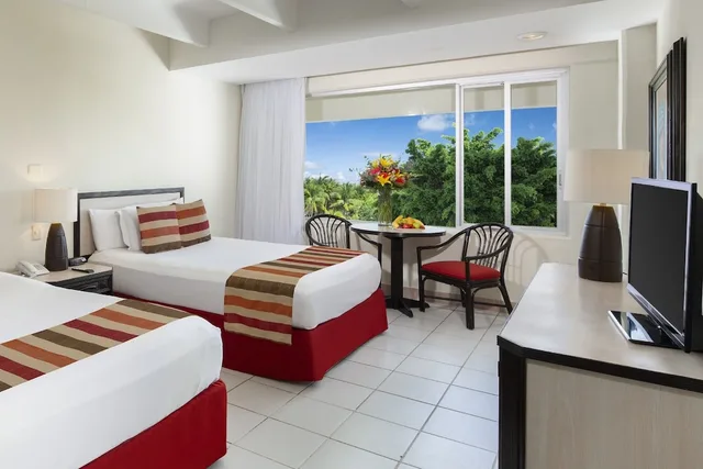 غرفة عائلية بسرير كينج وسريرين مزدوجين، Oasis Palm All Inclusive 5/9