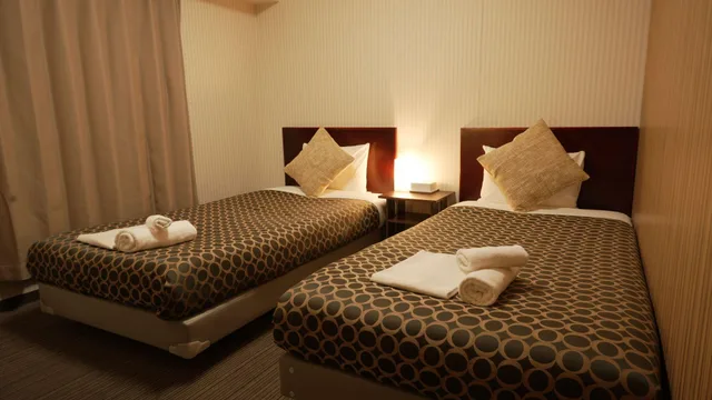 غرفة قياسية بسريرين منفصلين بإطلالة على المدينة، Hotel the Garden 6 Ichinomiya 1/1