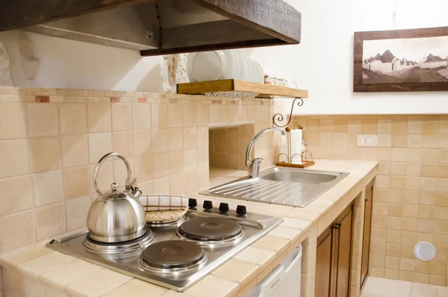 غرفة كومفورت بسرير كوين، Trulli Holiday Albergo Diffuso 3/5