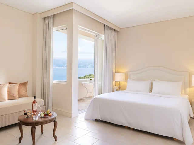 Guest Room, 1 Double and 1 Single Bed, Lateral Side Sea View، Grecotel Eva Palace 1/1