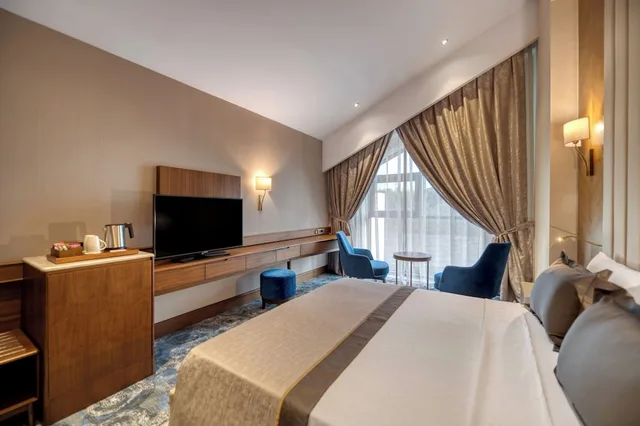 دوبلكس عائلي بسريرين منفصلين وسرير كينج بإطلالة على الجبل مع أريكة، BN Hotel Thermal & SPA Mersin 1/5