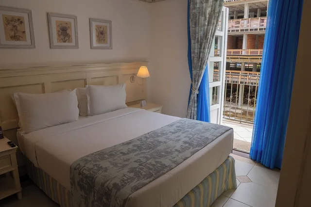 Puro, Suite, Queen Bed, City View, Sofa، IL Campanario Villaggio Resort - OFICIAL 1/8
