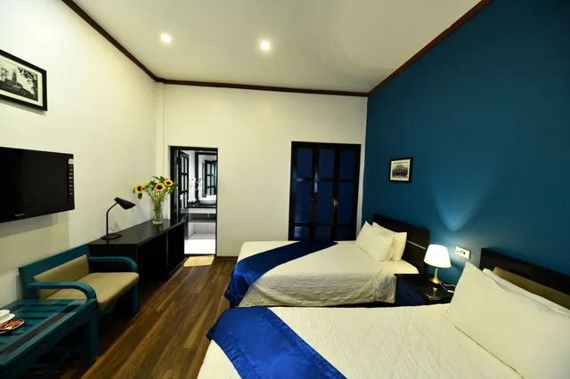 غرفة ديلوكس ثلاثية بسرير مزدوج وسرير فردي، Hanoi Starlight Hotel 2/5