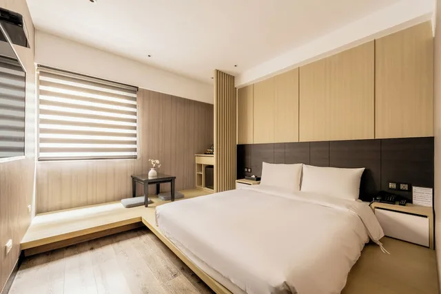 غرفة قياسية بسرير مزدوج بحوض استحمام، Jin Man Jia Hotel 1/7
