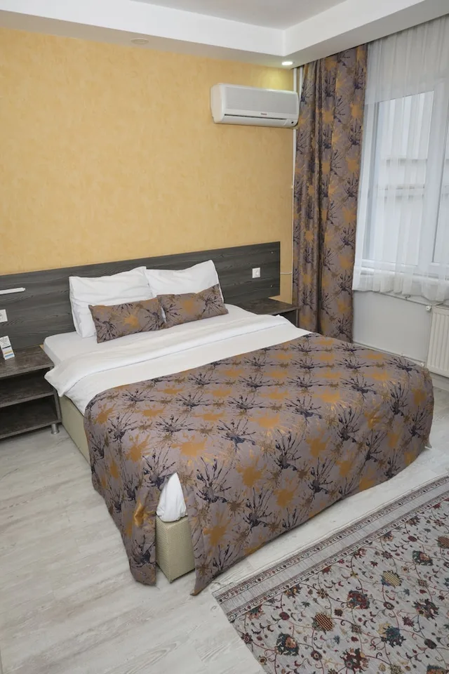 غرفة اقتصادية بسرير كوين، The Breeze Hotel 1/7