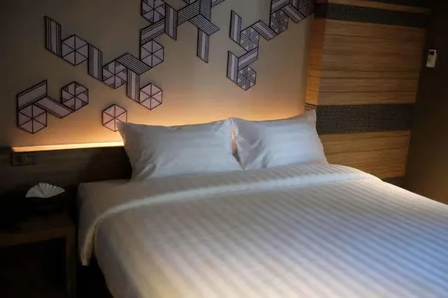 غرفة قياسية بسرير كينج في الطابق الأرضي، NAP HOTEL BANGKOK 1/3