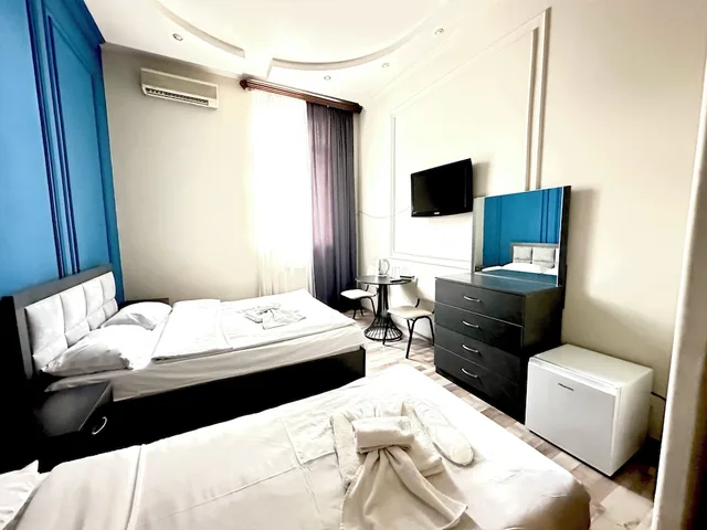 غرفة عائلية رباعية بسرير كوين وسريرين منفصلين، Bella Hotel 2/10