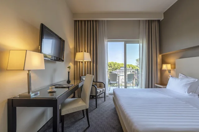 غرفة بسرير كوين، Villa Rosa Hotel 1/2