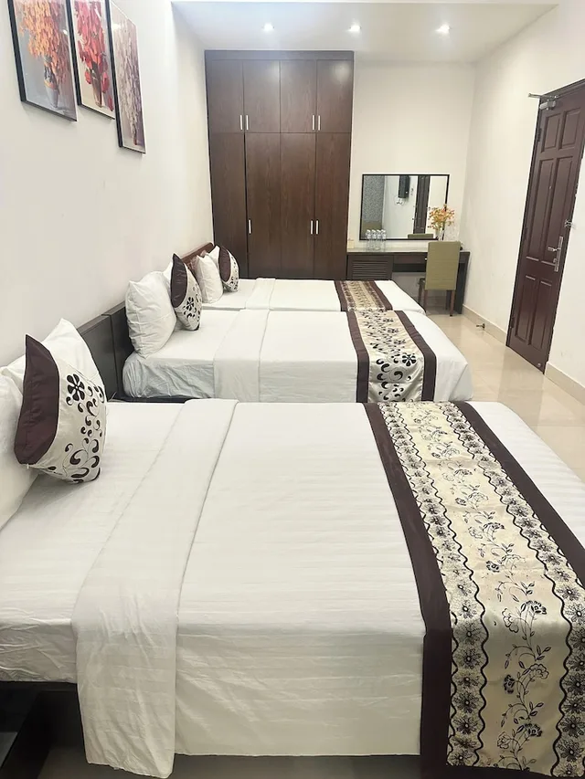 سكن مشترك مختلط عائلي بسريرين كوين، Ngoc Linh Luxury Hotel 1/1
