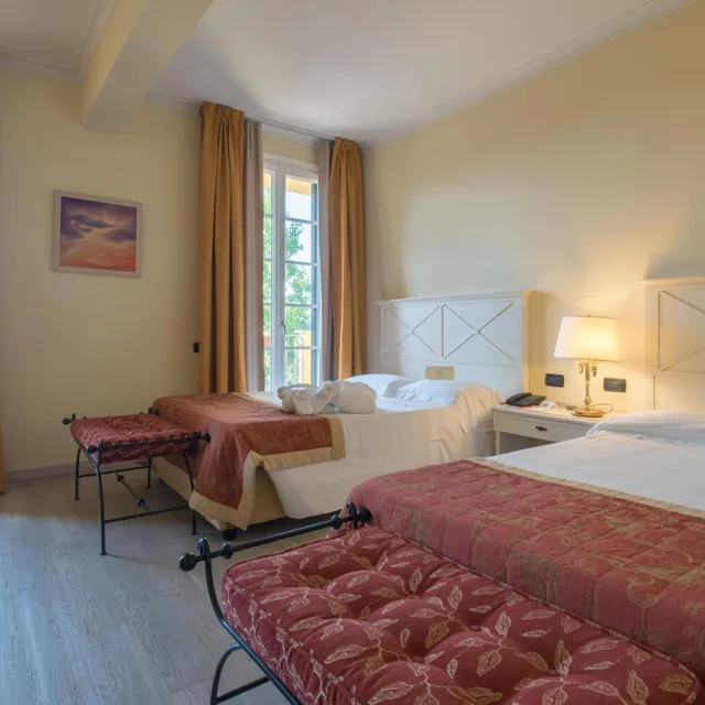 غرفة ديلوكس رباعية بسرير مزدوج بشرفة، Villa Cappugi 3/7