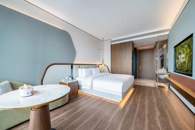 غرفة بزنس بسرير كينج، Wyndham Garden Jinan Huaiyin 2/3