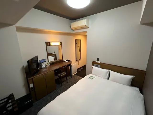 غرفة بسرير نصف مزدوج للمدخنين، Hotel Route-Inn Uozu 3/7