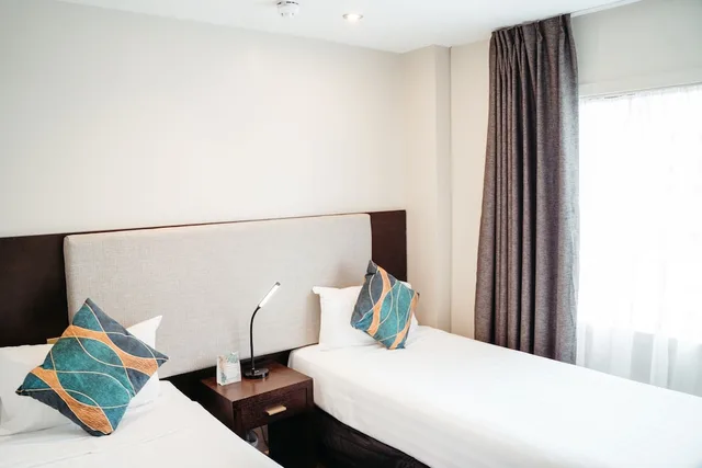شقة بسرير كينج وسرير كوين وسريرين فرديين بـ4 غرف نوم بمطبخ صغير، Auckland City Hotel 1/10