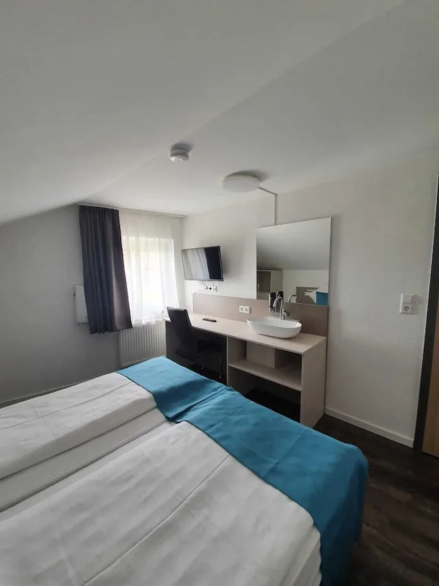 غرفة ديلوكس بسريرين منفصلين، Hotel BaWu 1/5