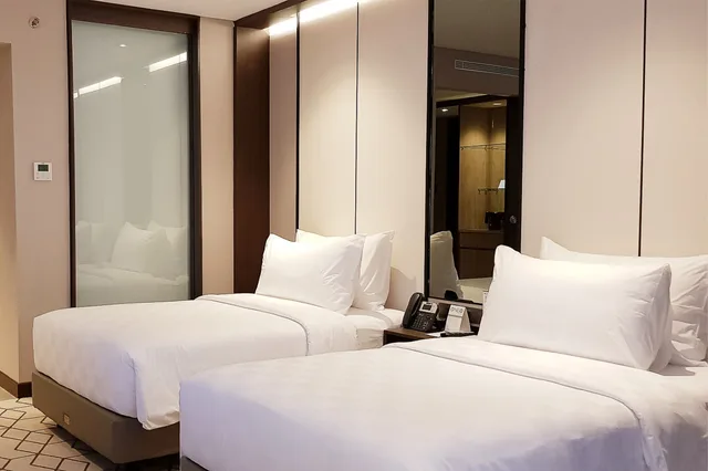 غرفة ديلوكس بسريرين منفصلين، Wyndham Opi Hotel Palembang 3/5